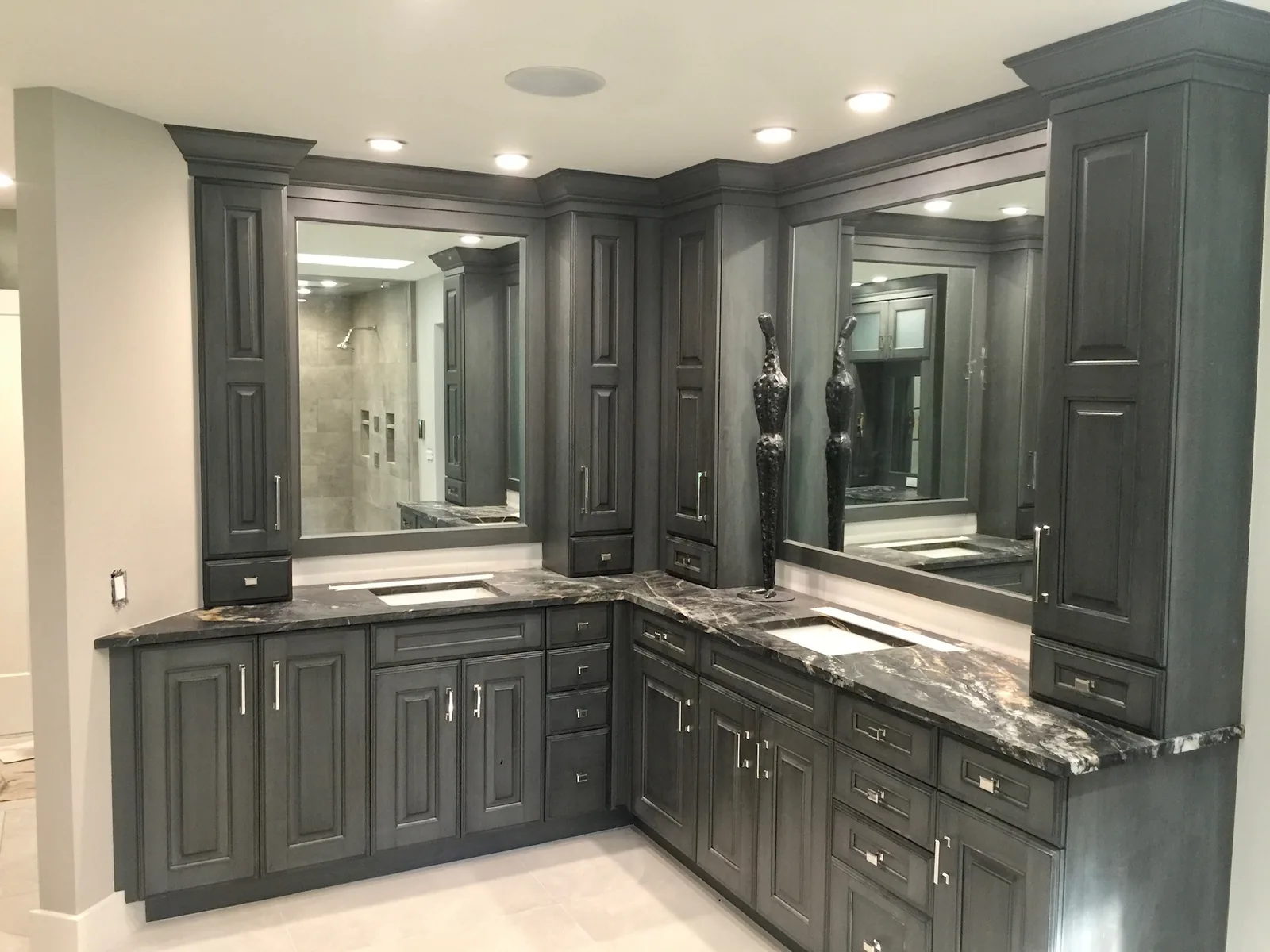 Bath with gray cabinetry and a double vanity — Caloosa, Palm Beach Gardens, FL