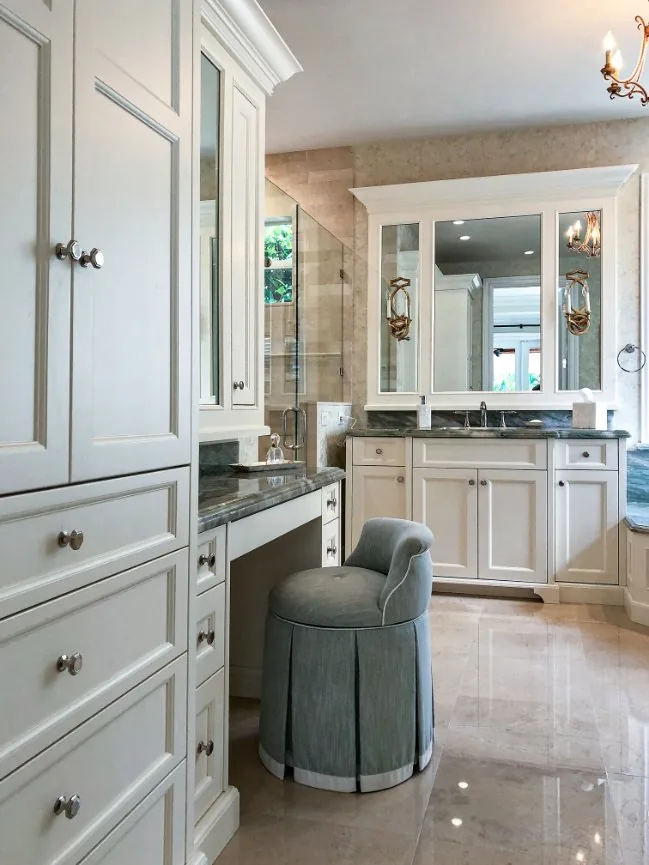 Bath vanity with gray painted cabinetry and a dressing stool — Loxahatchee Club, Jupiter, FL