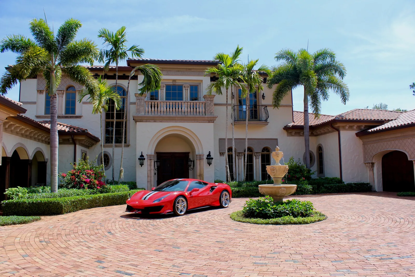 Completed estate residence in Jupiter, Florida, with a fountain courtyard