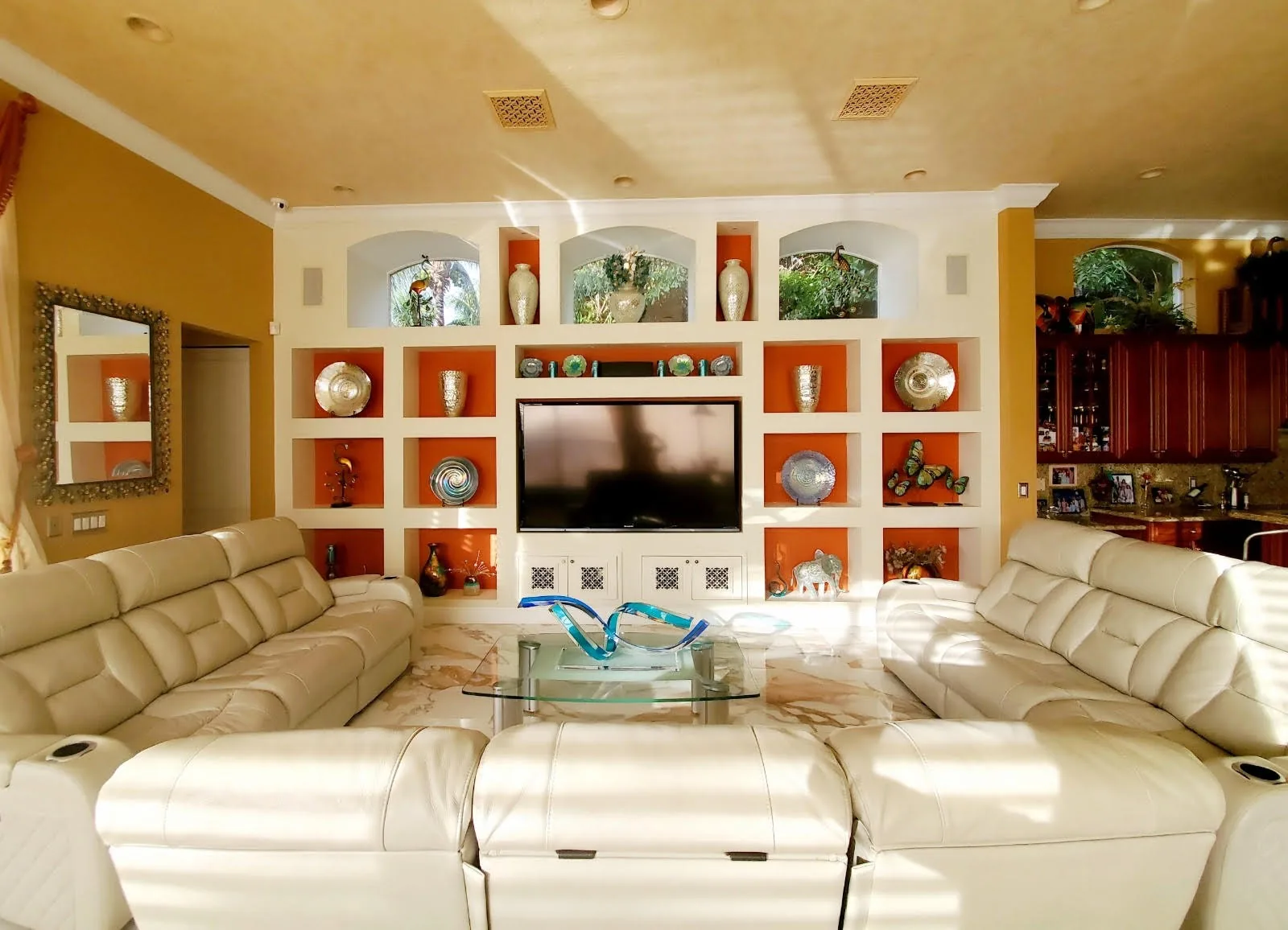 Family room with a built-in entertainment wall — Olympia, Wellington, FL