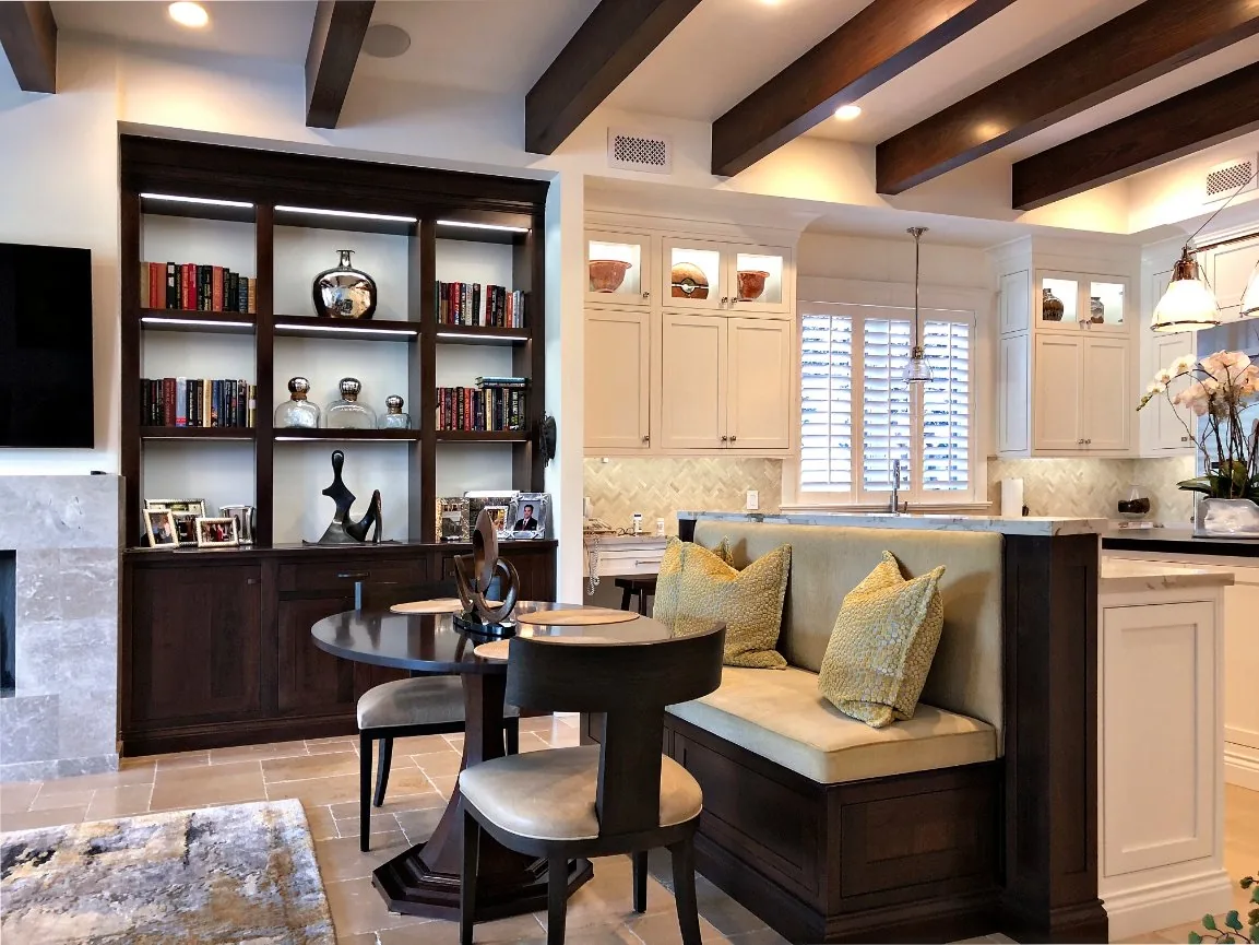 Kitchen and breakfast nook with dark built-in cabinetry under a beamed ceiling — Loxahatchee Club, Jupiter, FL