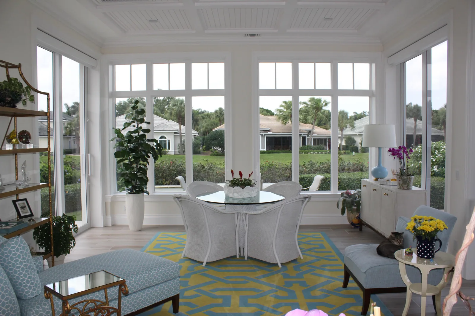 Sunroom with lattice ceiling and golf course view — Loxahatchee Club, Jupiter, FL