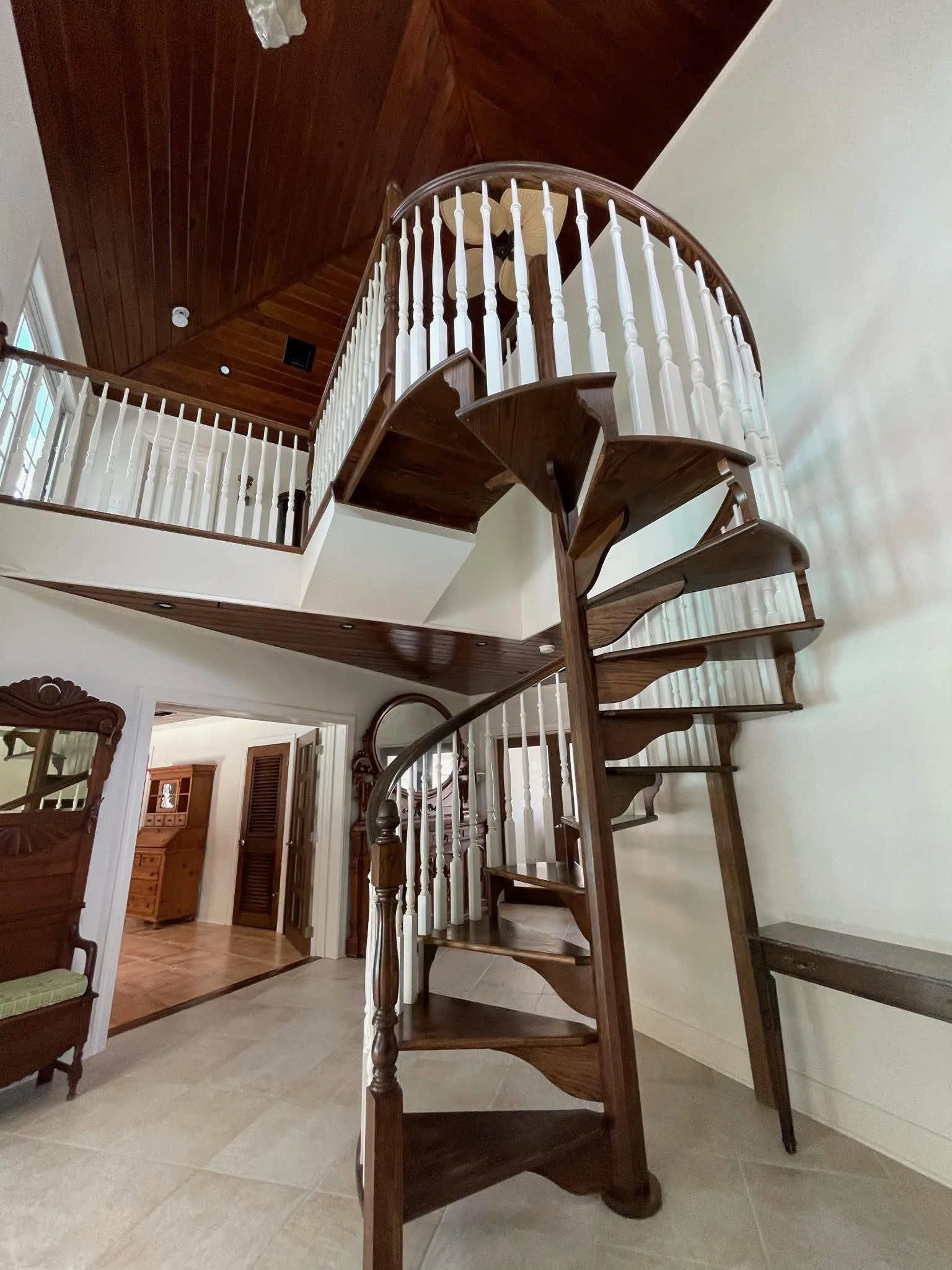 Interior spiral staircase with wood treads — Indian River, Hobe Sound, FL